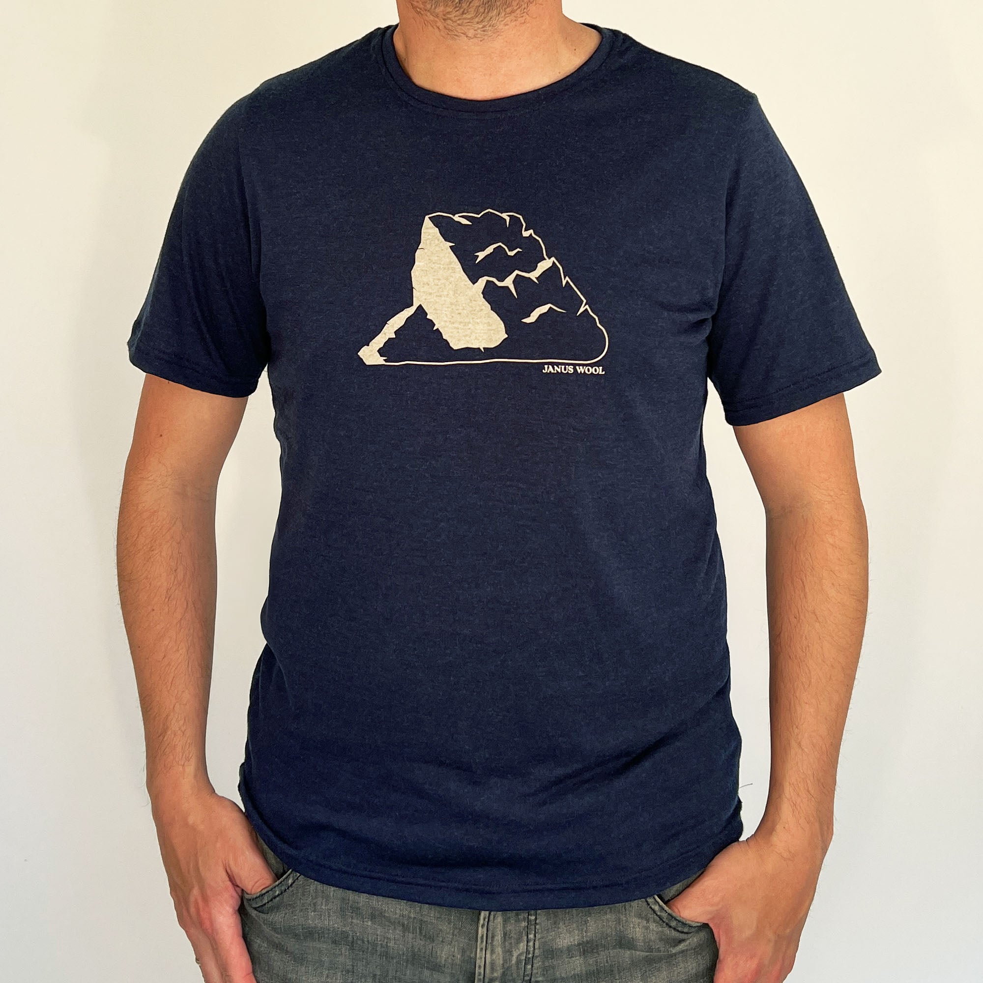 Janus merino blue t-shirt with a white graphic design on a plain background