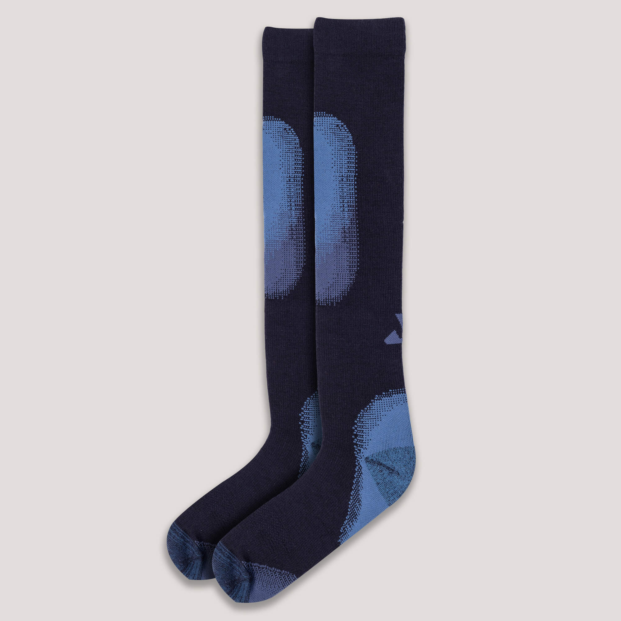 Pair of navy Janus Wool alpine ski socks with blue pattern on a light gray background