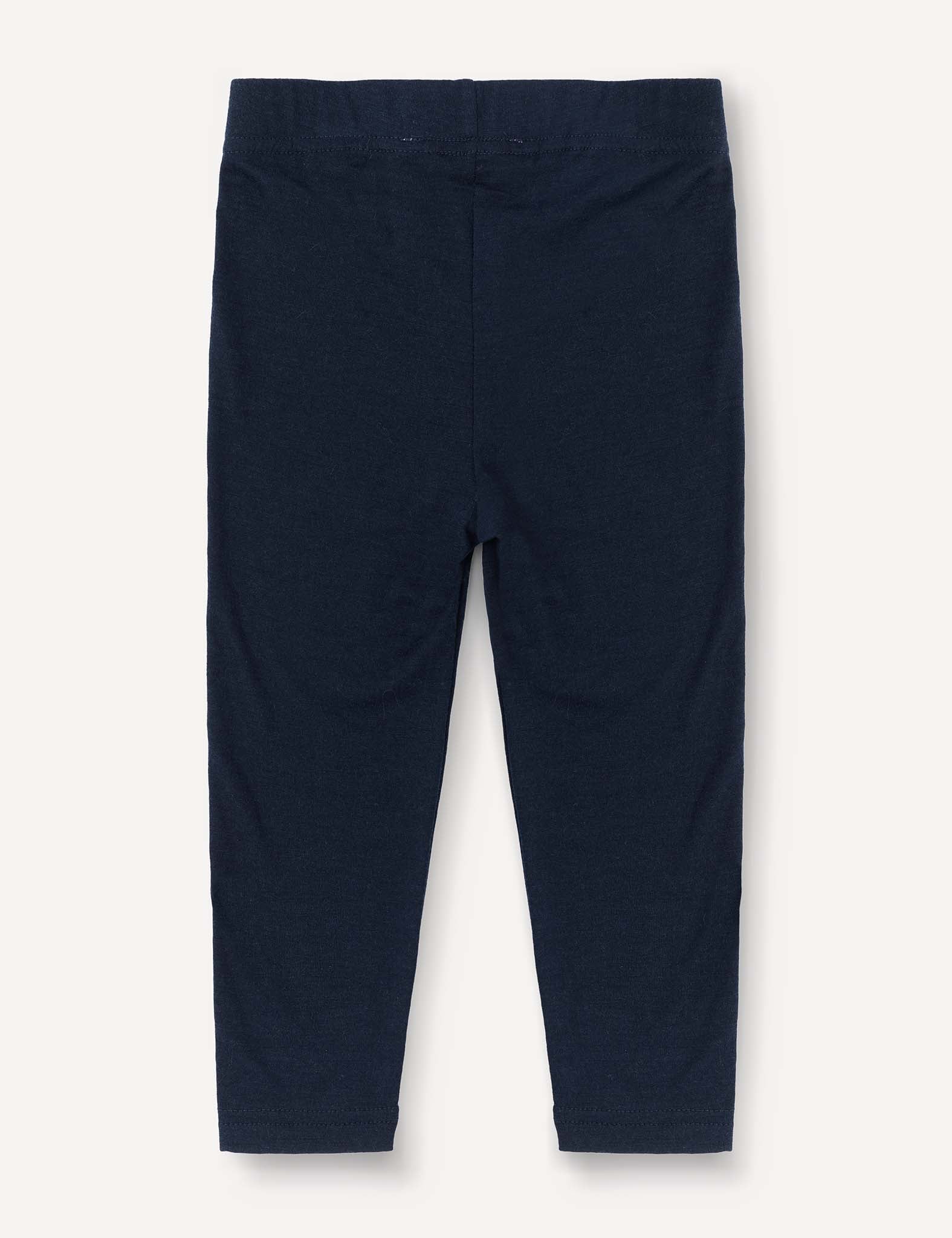 Leggings – Merino Baby Light in navy blue for toddlers, lightweight with an elastic waistband, shown flat on a light background from the back.