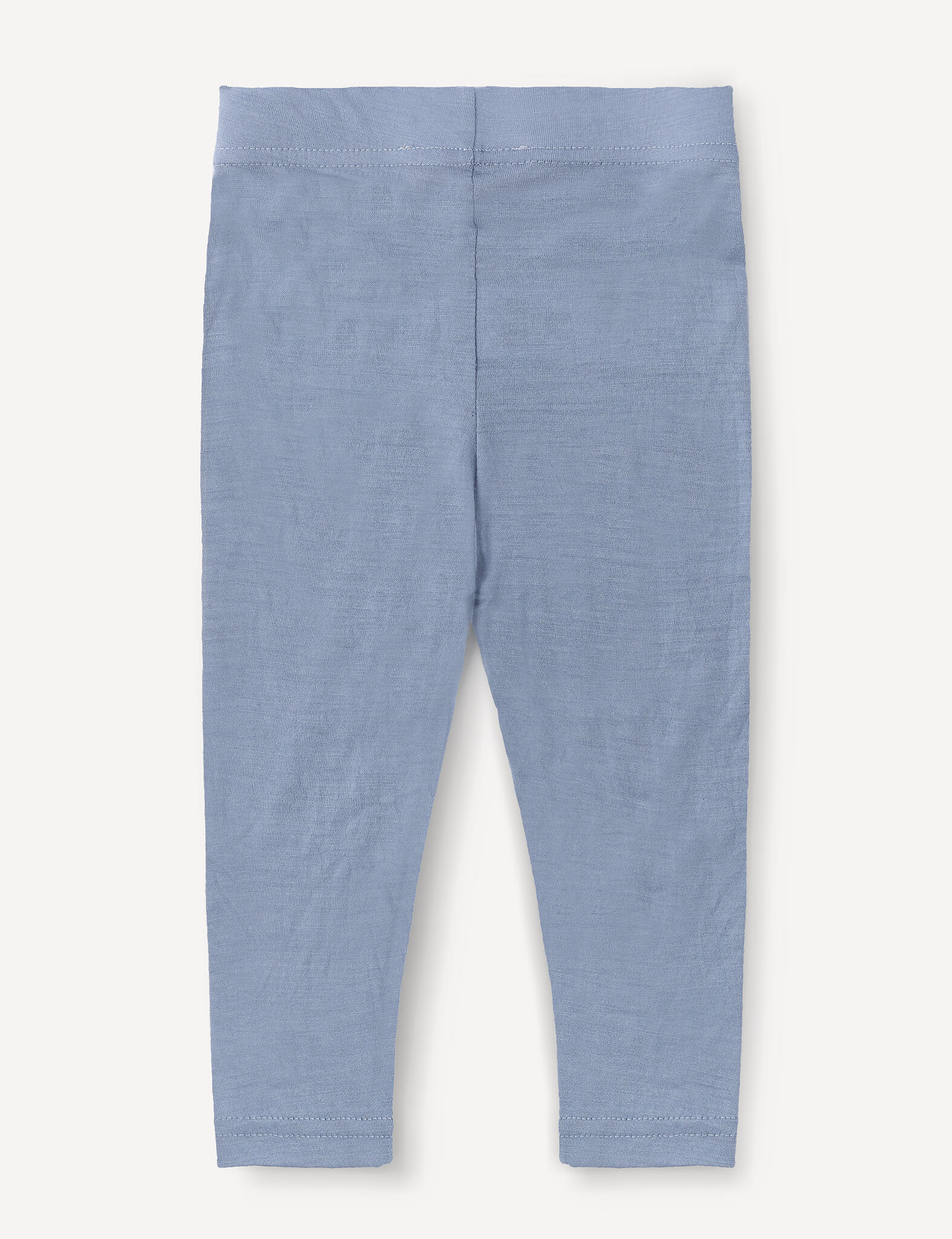 Light blue Leggings – Merino Baby Light laid flat and shown from the back, featuring a simple, unadorned design. These lightweight base layer leggings offer comfortable everyday wear for babies.