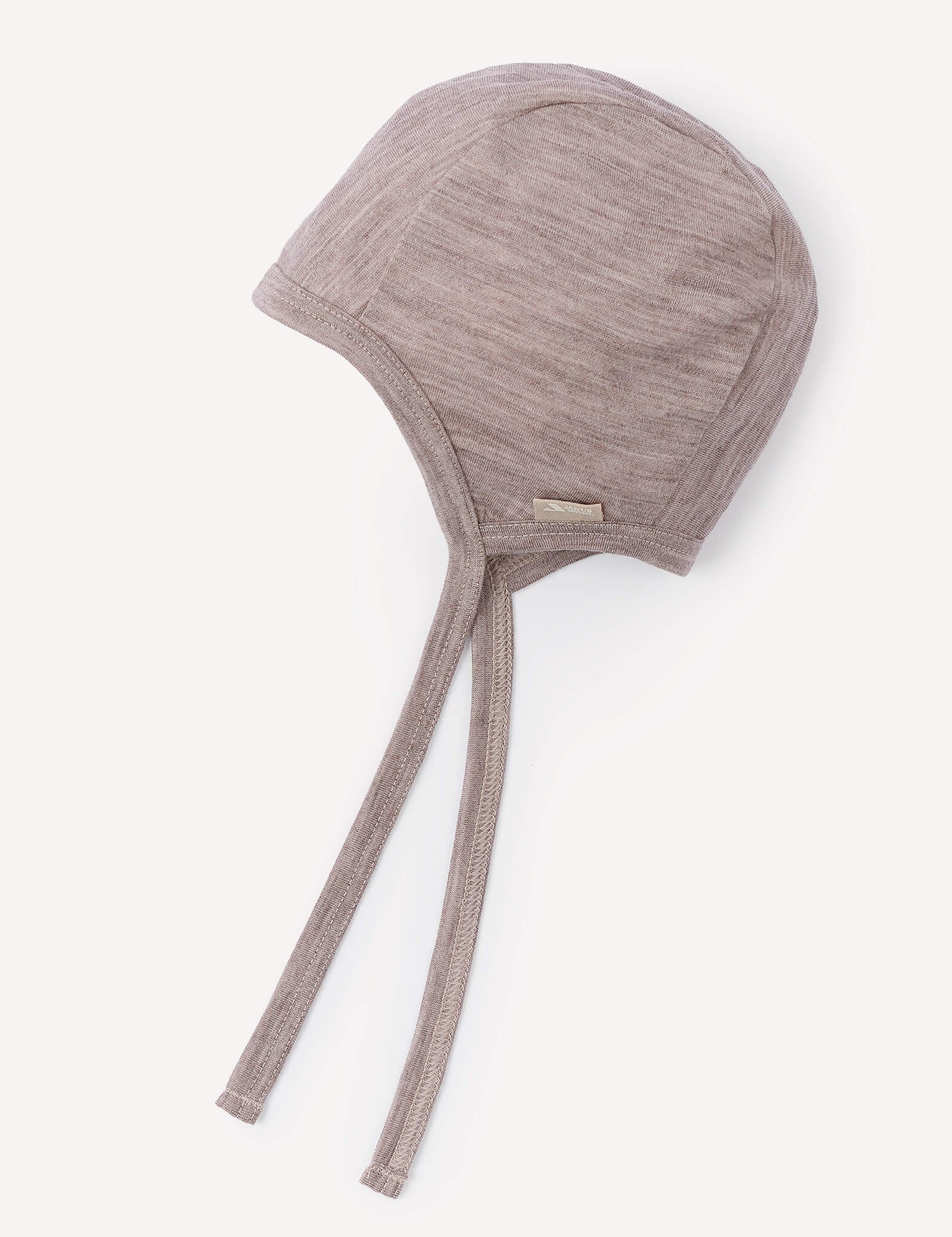 A soft, beige melange Bonnet – Merino Baby Light made of textured merino wool with two long chin straps is displayed on a plain white background.