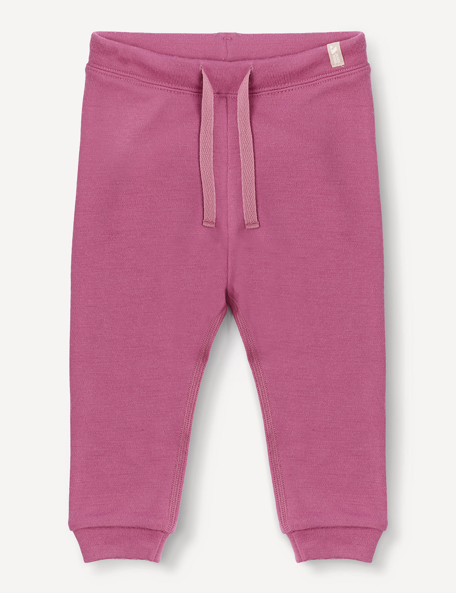 Merino Baby AirWool Pants in pink, featuring an adjustable drawcord waistband and ribbed cuffs, crafted from soft brushed AirWool, displayed on a plain white background.
