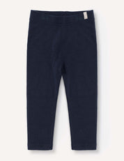 Navy Leggings – Merino Baby AirWool for babies or toddlers displayed flat on a light background, featuring an elastic waistband and a small fabric tag on the left hip.