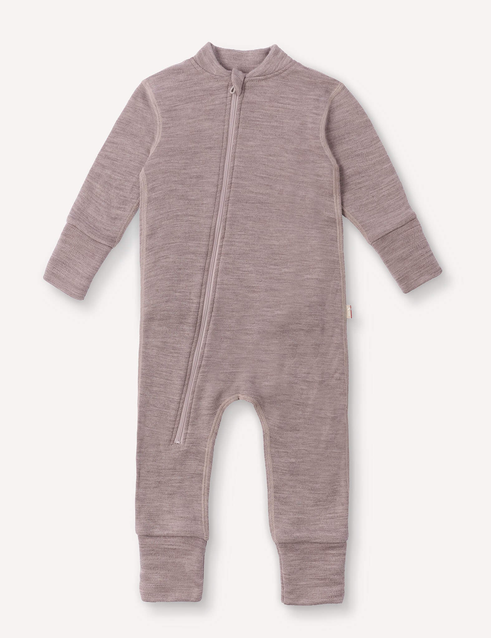 A long-sleeve, full-length Onesie – Merino Baby AirWool in Beige Melange featuring a front diagonal zipper, ribbed and fold-over cuffs, and a simple, minimalist design.