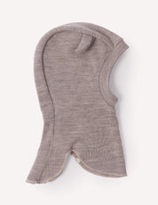 The Balaclava – Merino Baby AirWool in Beige Melange is a soft, knit merino wool balaclava for children, featuring a single ear-like detail on top and a face opening. This breathable headwear ensures lasting comfort and warmth throughout the day.