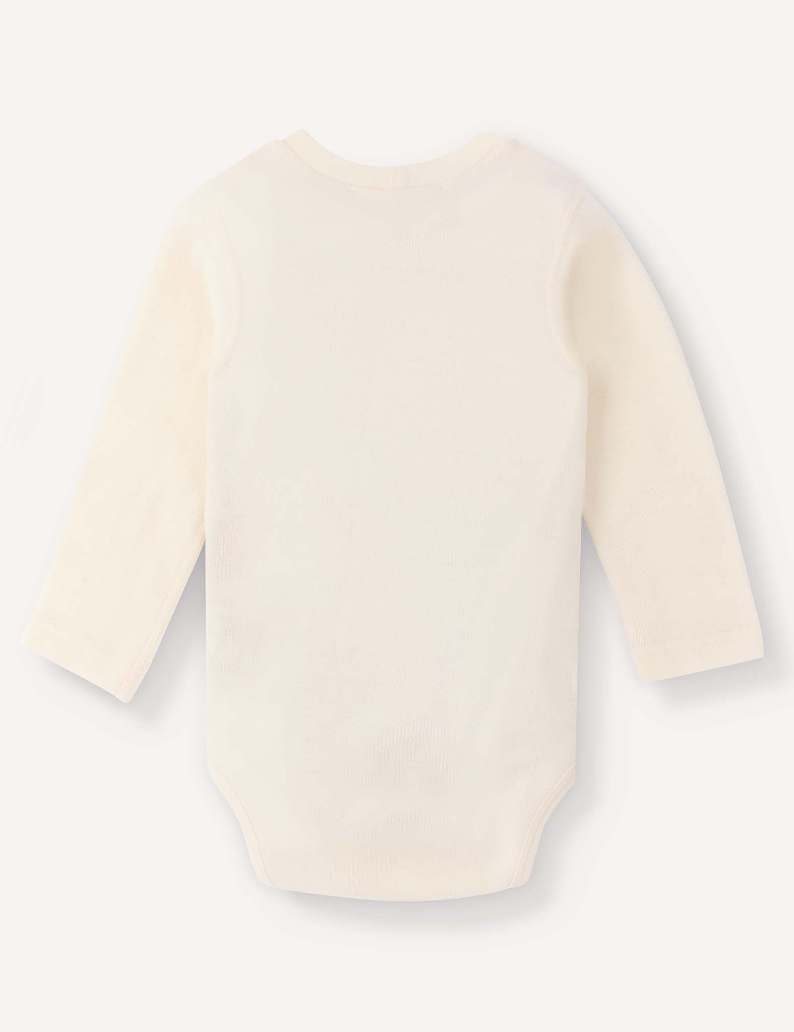 A long-sleeve Body – Merino Baby AirWool in cream is displayed laid flat, with the back side facing up against a plain white background, showcasing its breathable merino wool comfort for your baby.
