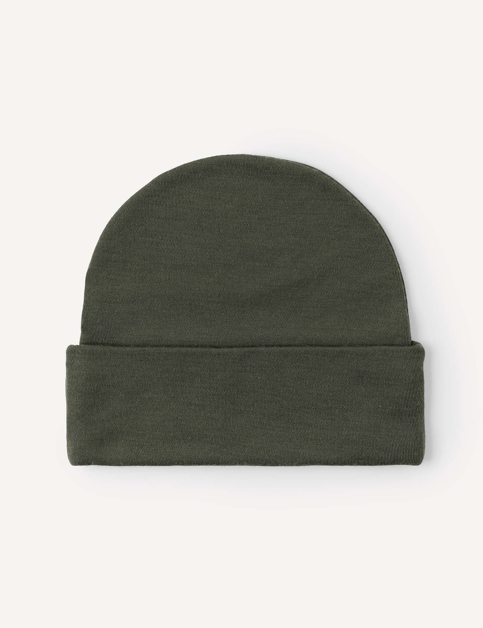 The Beanie – Merino Kids AirWool in olive green is shown on a light background. This beanie features a folded bottom for extra warmth and a simple, minimalist design.
