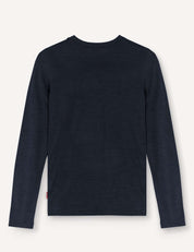 The Crewneck – Merino Kids Light is displayed from the back, laid flat on a light background. Made from soft merino wool jersey, it offers both comfort and warmth in a navy blue long-sleeve design.