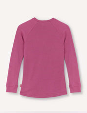 A long-sleeve Crewneck – Merino Kids AirWool jersey in solid pink, crafted from AirWool 260 merino wool, shown from the back against a white background.