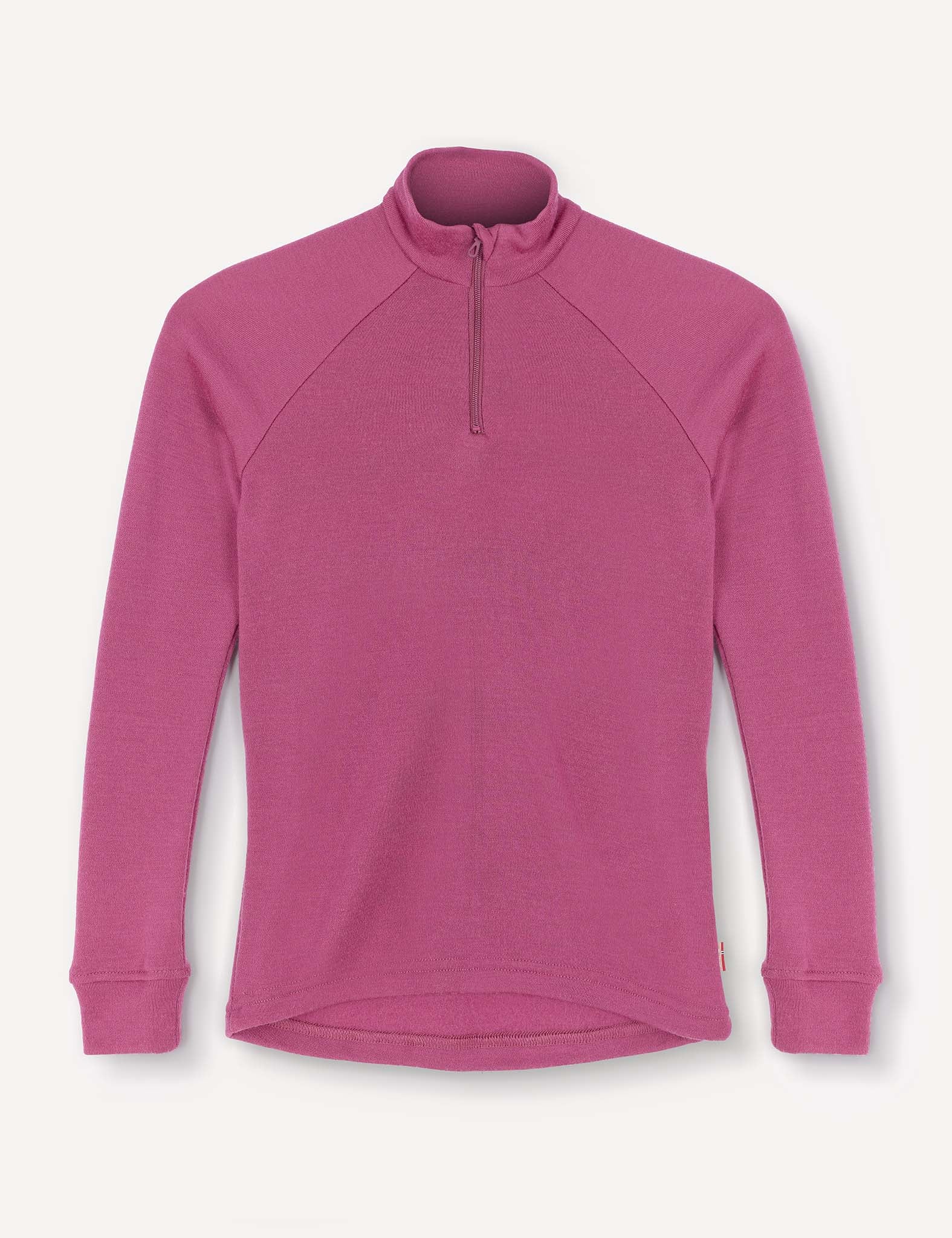 The Half Zip – Merino Kids AirWool is a magenta long-sleeve shirt with raglan sleeves, a high neck, ribbed cuffs, and a partial front zipper, displayed on a white background.