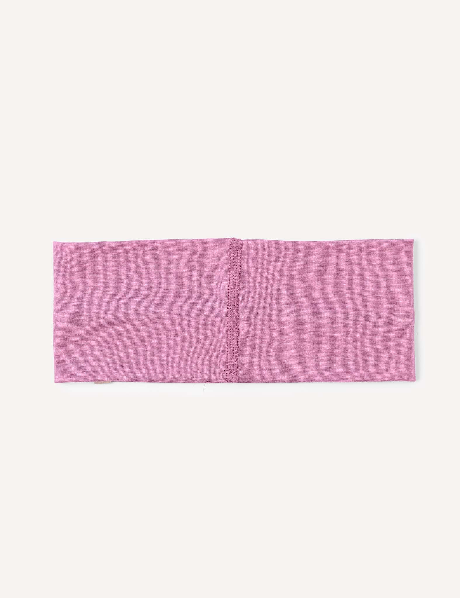 The Headband – Merino Kids Light is a folded, rectangular headband in light purple merino wool, featuring a visible vertical center seam and displayed flat on a plain white background.