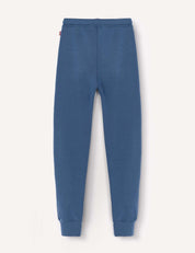 The Merino Kids AirWool Sweatpants are shown laid flat on a white background, highlighting their elastic waistband and ankle cuffs. These cozy sweatpants have a simple, logo-free design with no visible patterns or pockets.