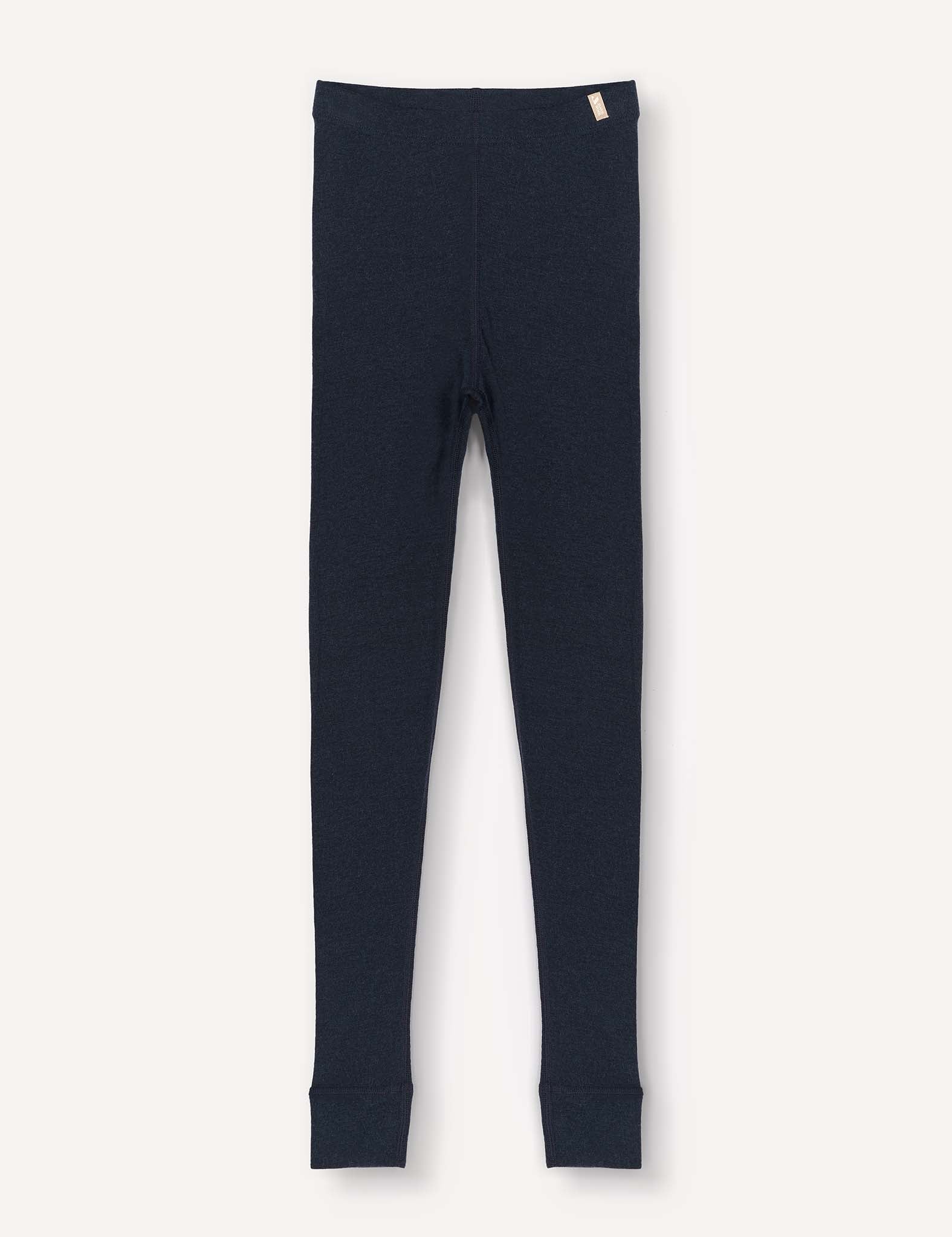 Navy, long, fitted thermal leggings—Leggings – Merino Kids Classic Rib—crafted from elastic ribbed wool, featuring a small beige tag on the waistband and displayed flat against a white background.