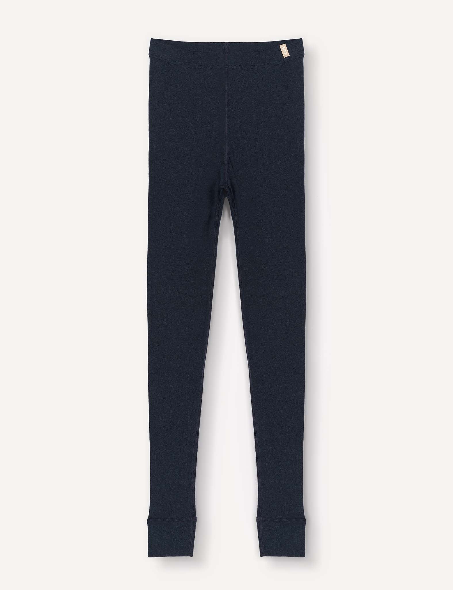 Navy, long, fitted thermal leggings—Leggings – Merino Kids Classic Rib—crafted from elastic ribbed wool, featuring a small beige tag on the waistband and displayed flat against a white background.