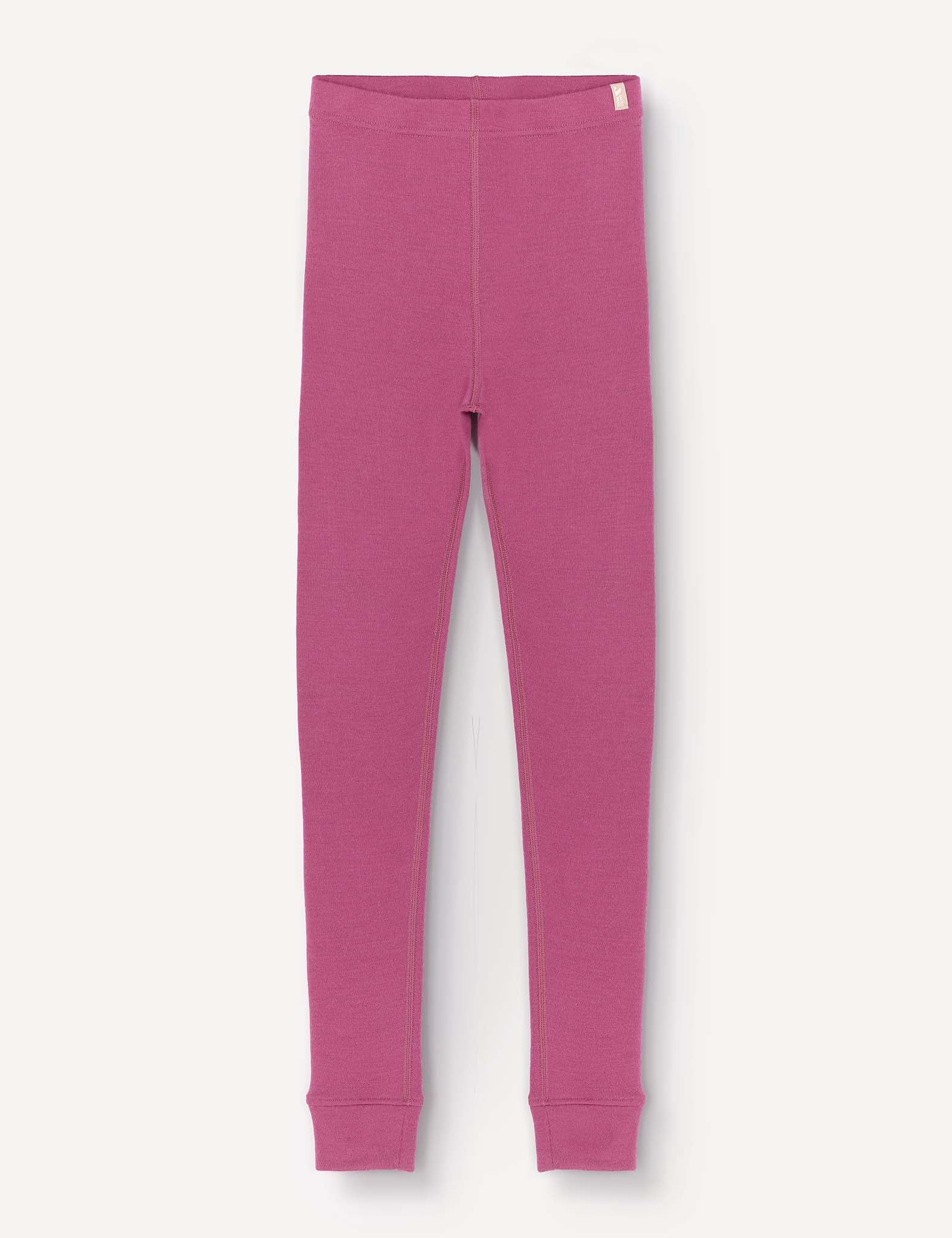The Leggings – Merino Kids AirWool are displayed flat on a white background, highlighting their full-length, simple design with an elastic waistband and fitted ankles. Crafted from soft brushed Merino wool, these pink children’s leggings offer added comfort.
