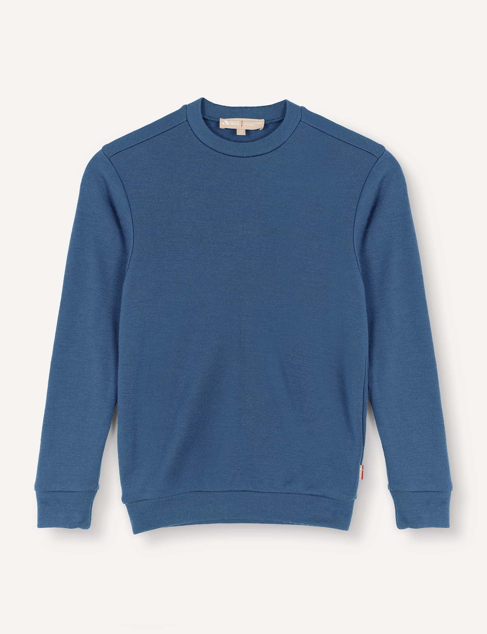 A Pullover – Merino Kids AirWool in Ensign Blue, featuring a crewneck, long sleeves, and ribbed cuffs and hem, displayed flat on a white background.