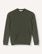 A Forest Night Pullover – Merino Kids AirWool, crafted from flexible wool in a crewneck style, features long sleeves with ribbed cuffs and a ribbed waistband, and is displayed on a light background.