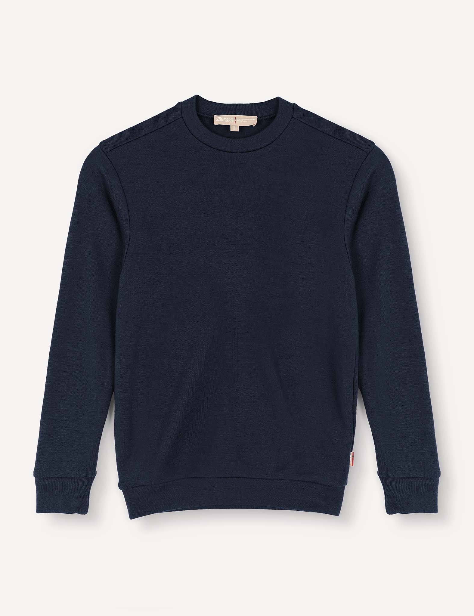 A Pullover – Merino Kids AirWool sweater in navy is displayed flat against a light background. This long-sleeved crewneck features a plain design with no visible patterns, logos, or graphics.