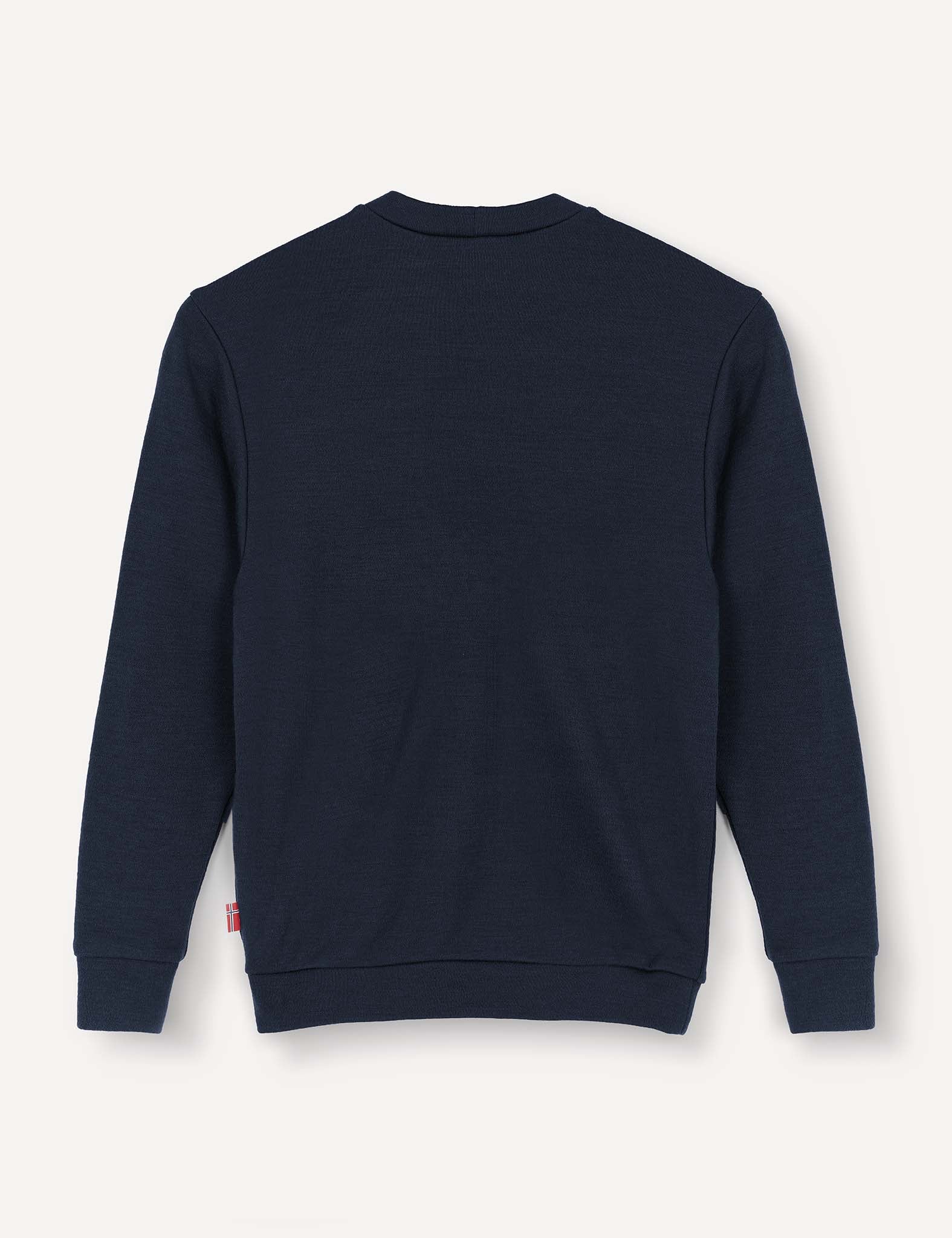 A Pullover – Merino Kids AirWool in navy blue with long sleeves, featuring ribbed cuffs and waistband, is shown from the back against a plain off-white background.