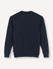 A Pullover – Merino Kids AirWool in navy blue with long sleeves, featuring ribbed cuffs and waistband, is shown from the back against a plain off-white background.
