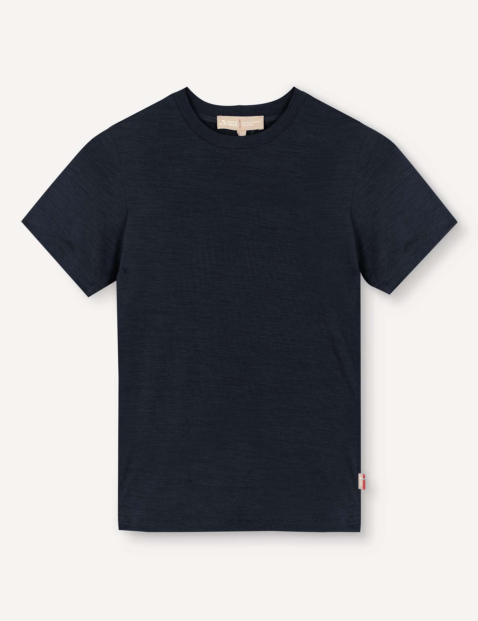 The T-Shirt – Merino Kids Light in Navy is displayed flat against a light background, offering all-day comfort and natural temperature regulation.